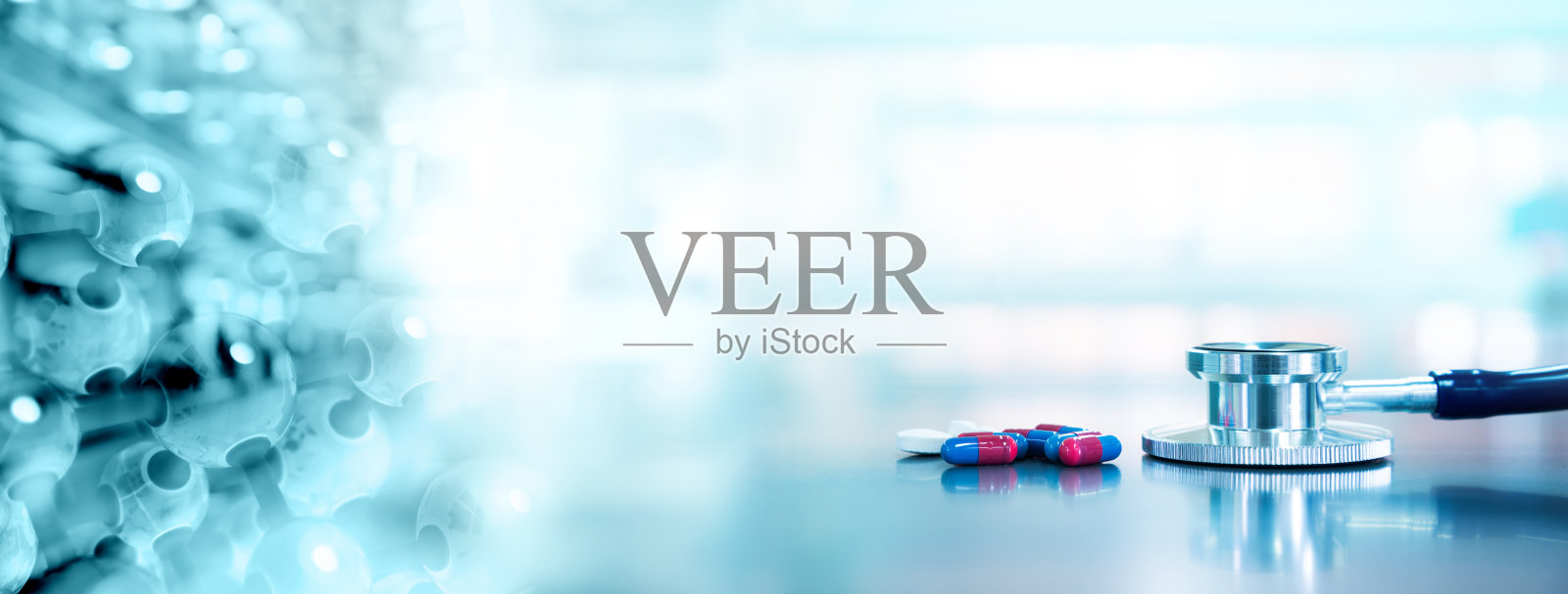 听诊器与胶囊药物与分子化学结构在蓝色健康科学实验室旗帜背景下照片摄影图片