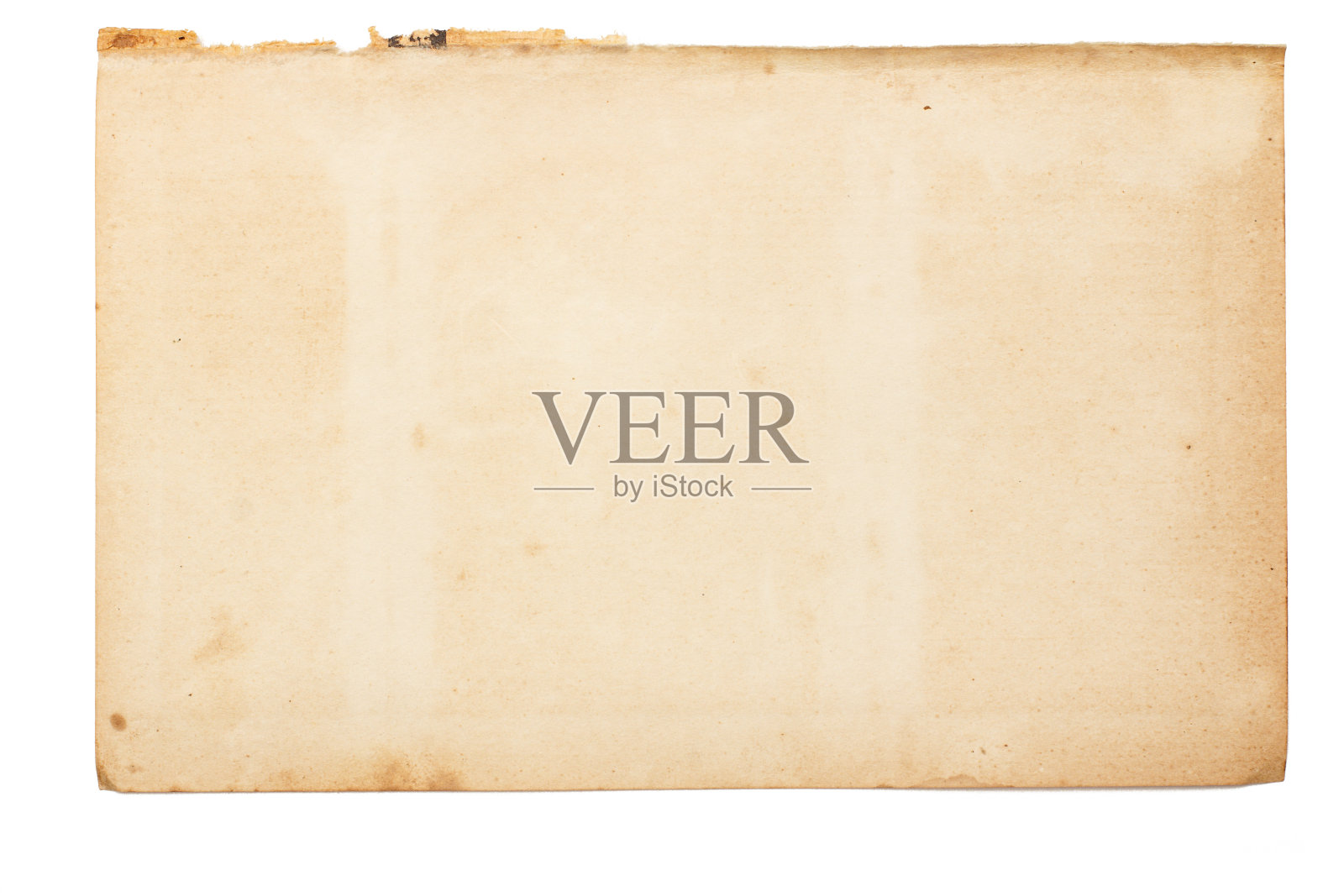 带有不均匀撕裂边缘的旧泛黄纸张照片摄影图片