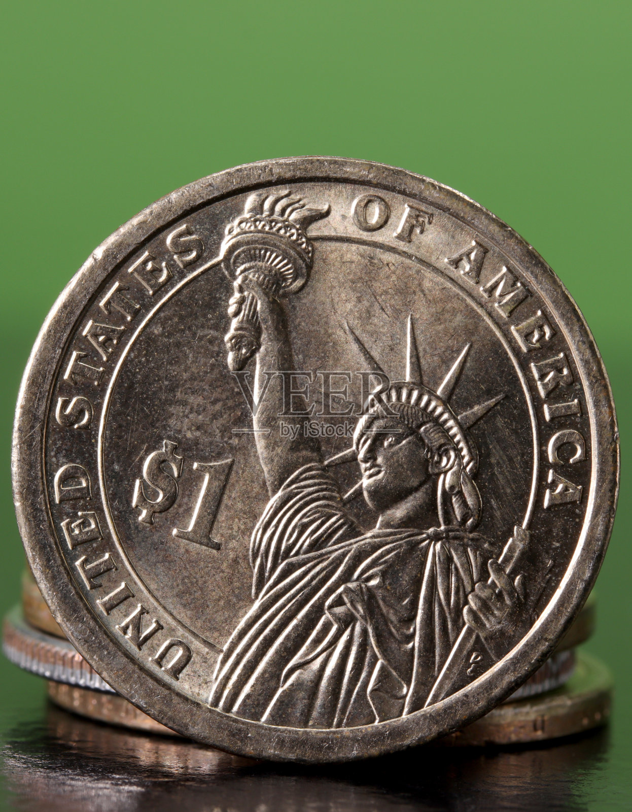 特写一美元硬币的背景细节照片摄影图片