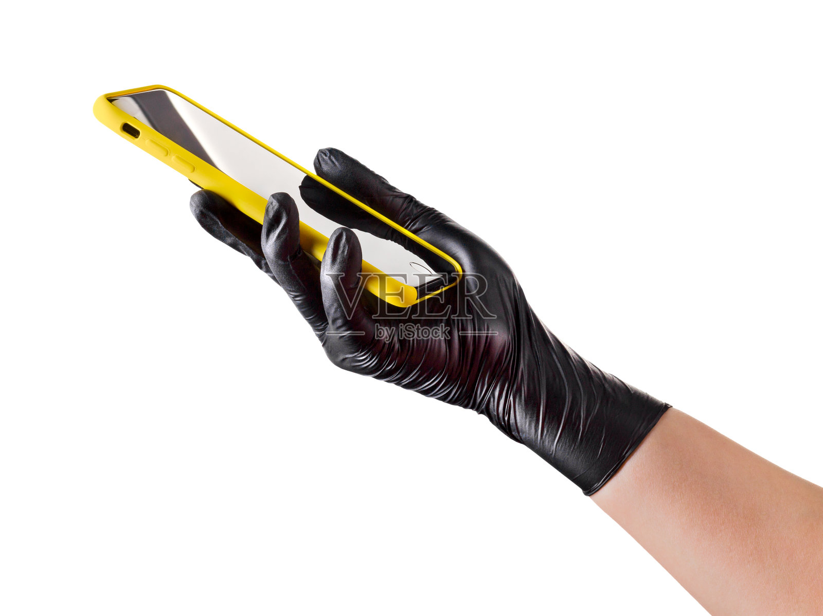 手戴黑色手套手持手机，白屏隔离在白色上照片摄影图片