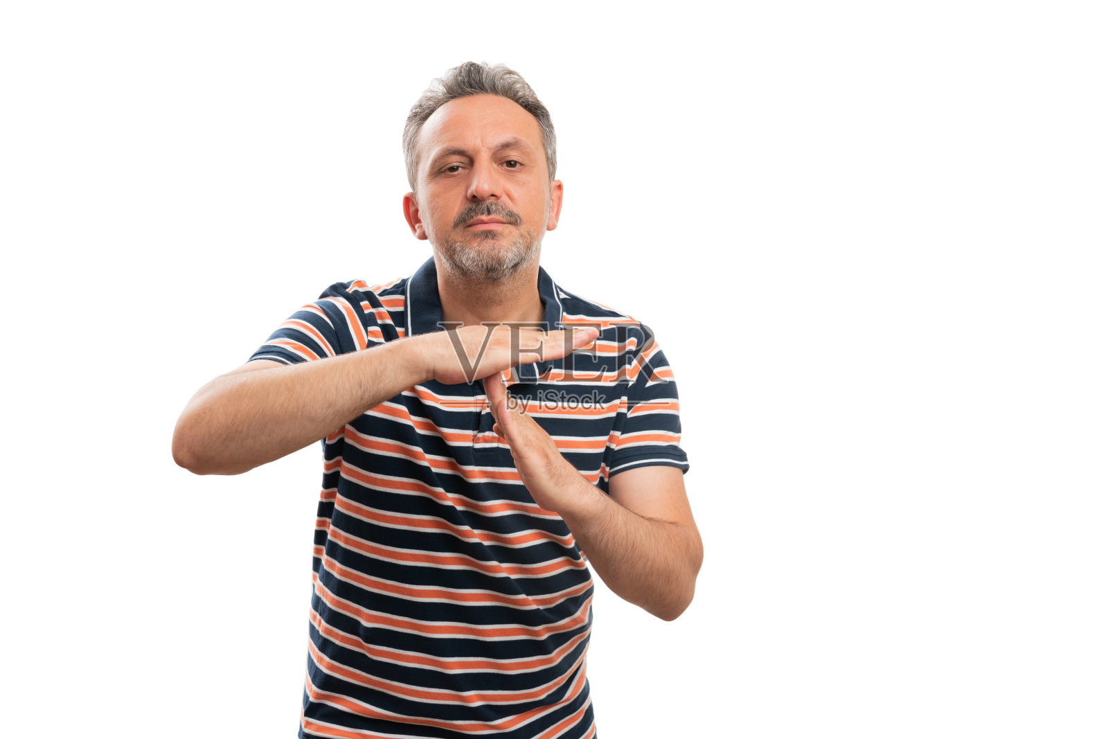 严肃的成年人用手做停顿手势照片摄影图片