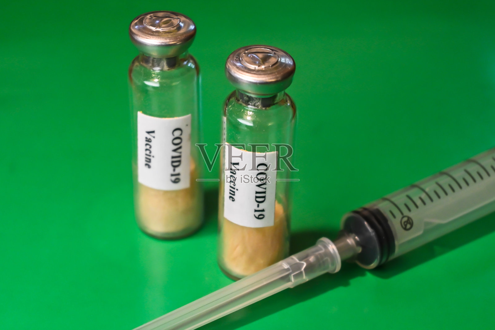 预防冠状病毒感染的疫苗接种。照片摄影图片