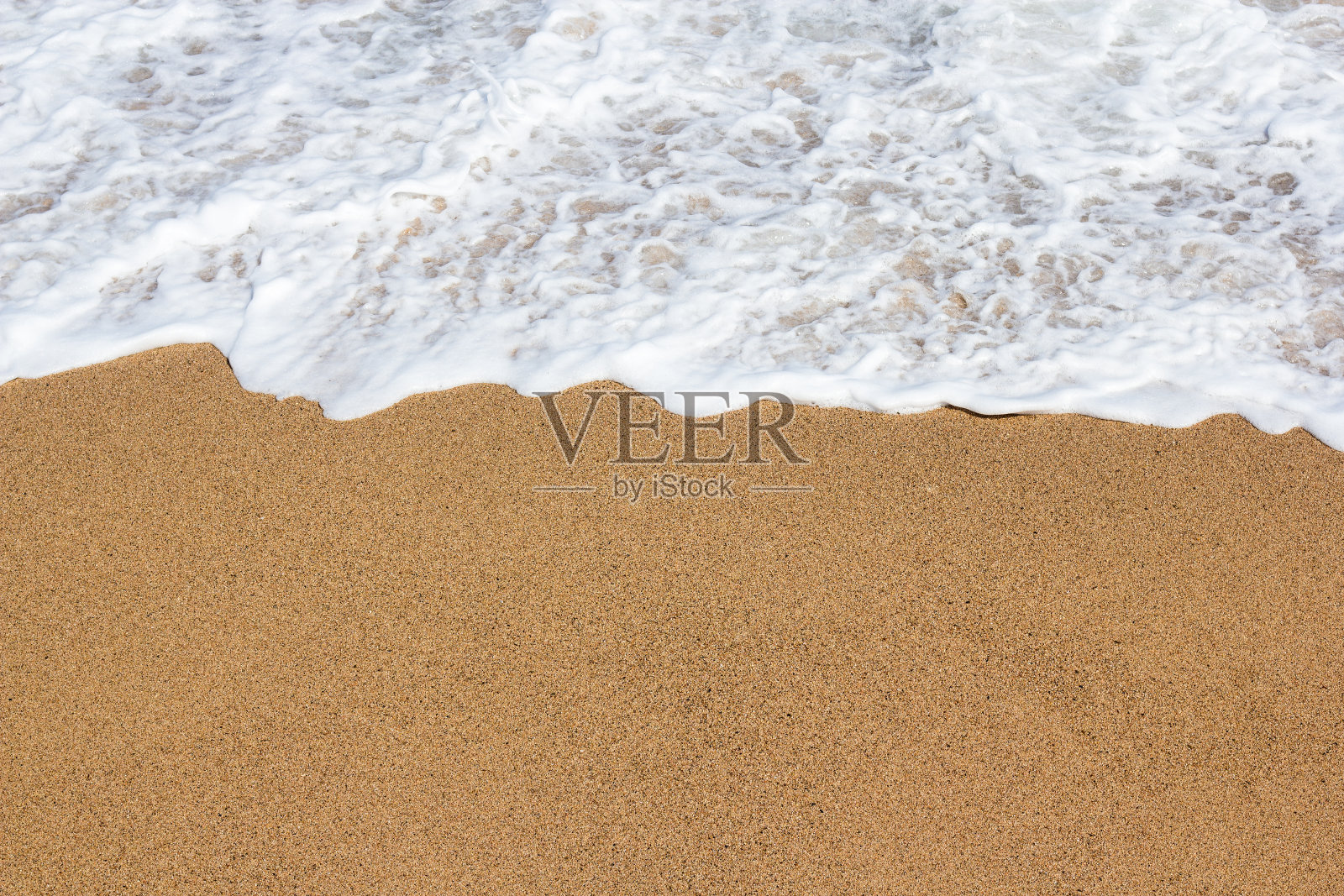 夏天的背景-海滩上的沙子和海水的特写照片摄影图片