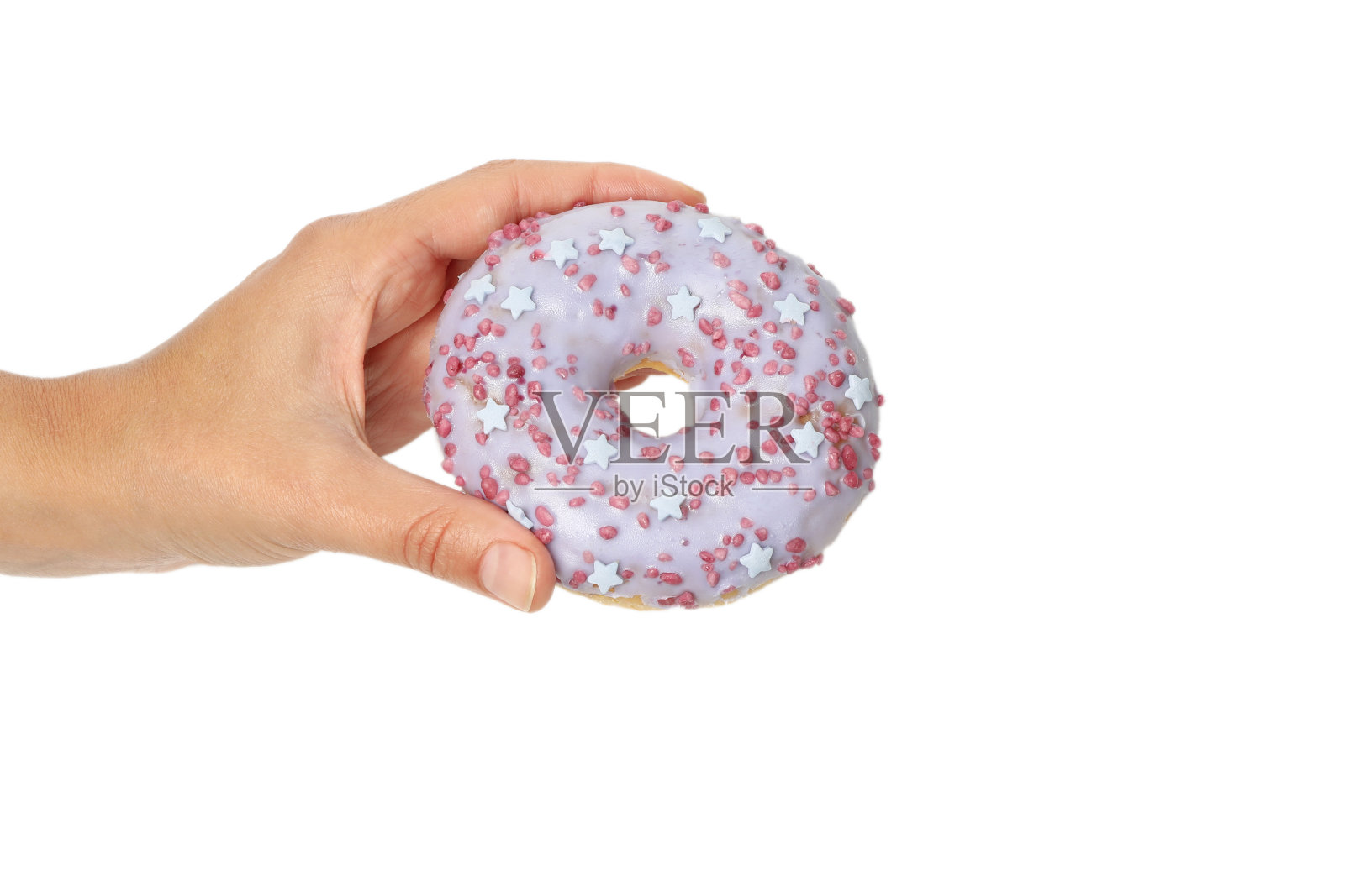 女性手握甜甜圈，孤立在白色背景上照片摄影图片
