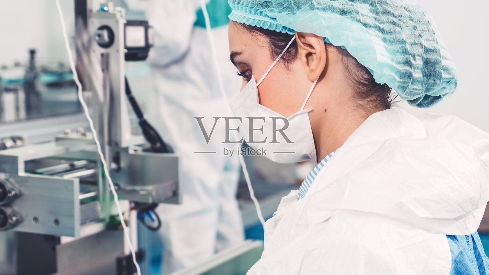 现代化的口罩生产线工厂照片摄影图片