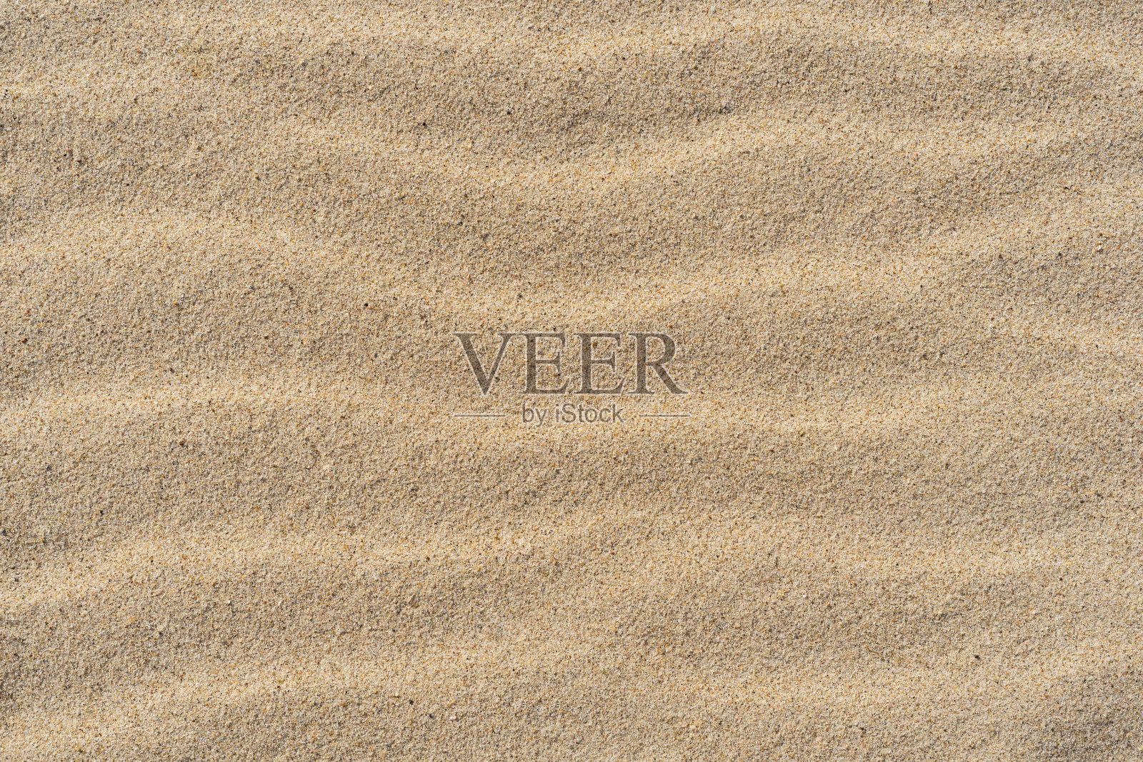 彩砂。前视图。以沙滩为背景。照片摄影图片