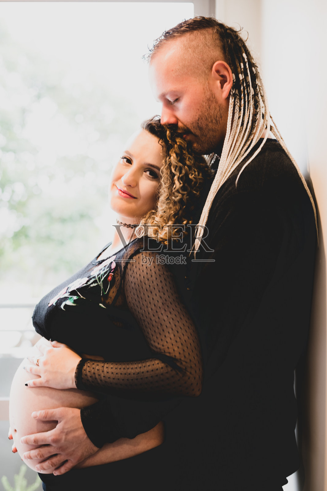 夫妇，男人和孕妇。照片摄影图片