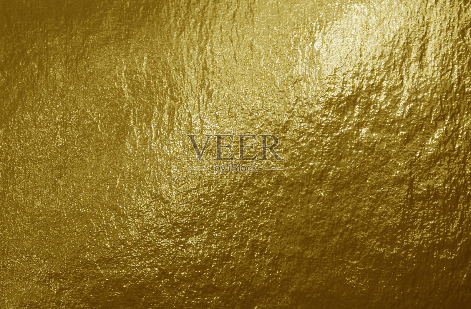 金箔背景与高光和不均匀的纹理照片摄影图片