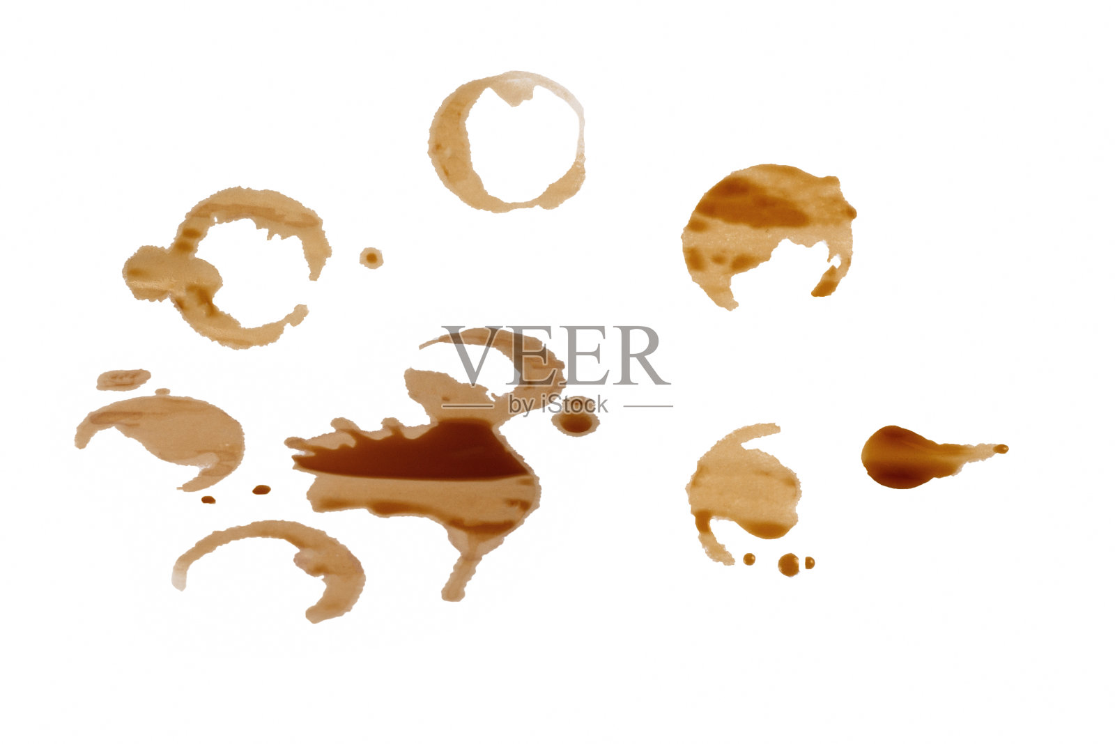 白色背景上分离出咖啡渍。照片摄影图片