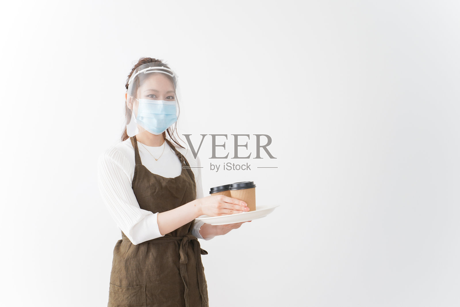 咖啡馆员工正在处理冠状病毒照片摄影图片