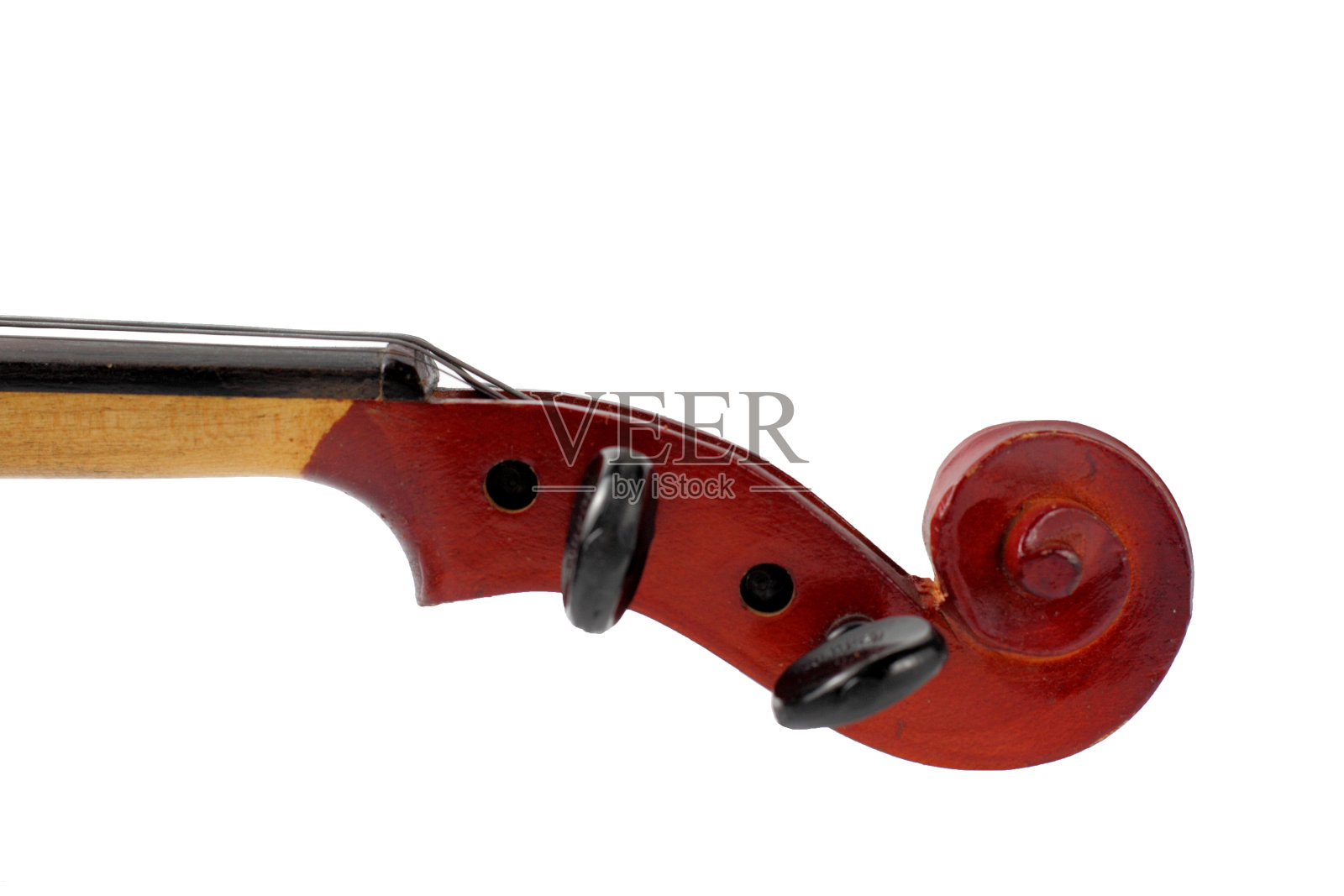 调音栓小提琴特写，孤立在一个白色的背景，乐器。照片摄影图片