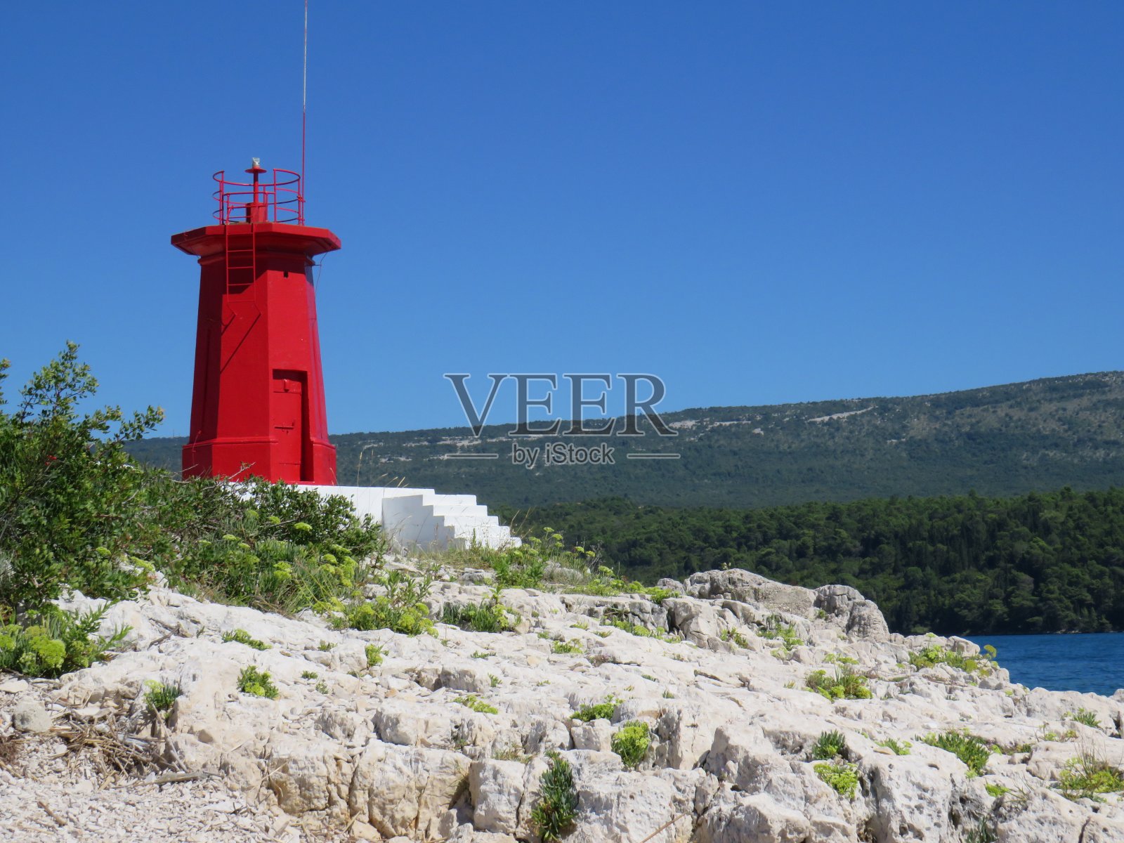 克罗地亚伊斯特里亚海湾上的小灯塔照片摄影图片