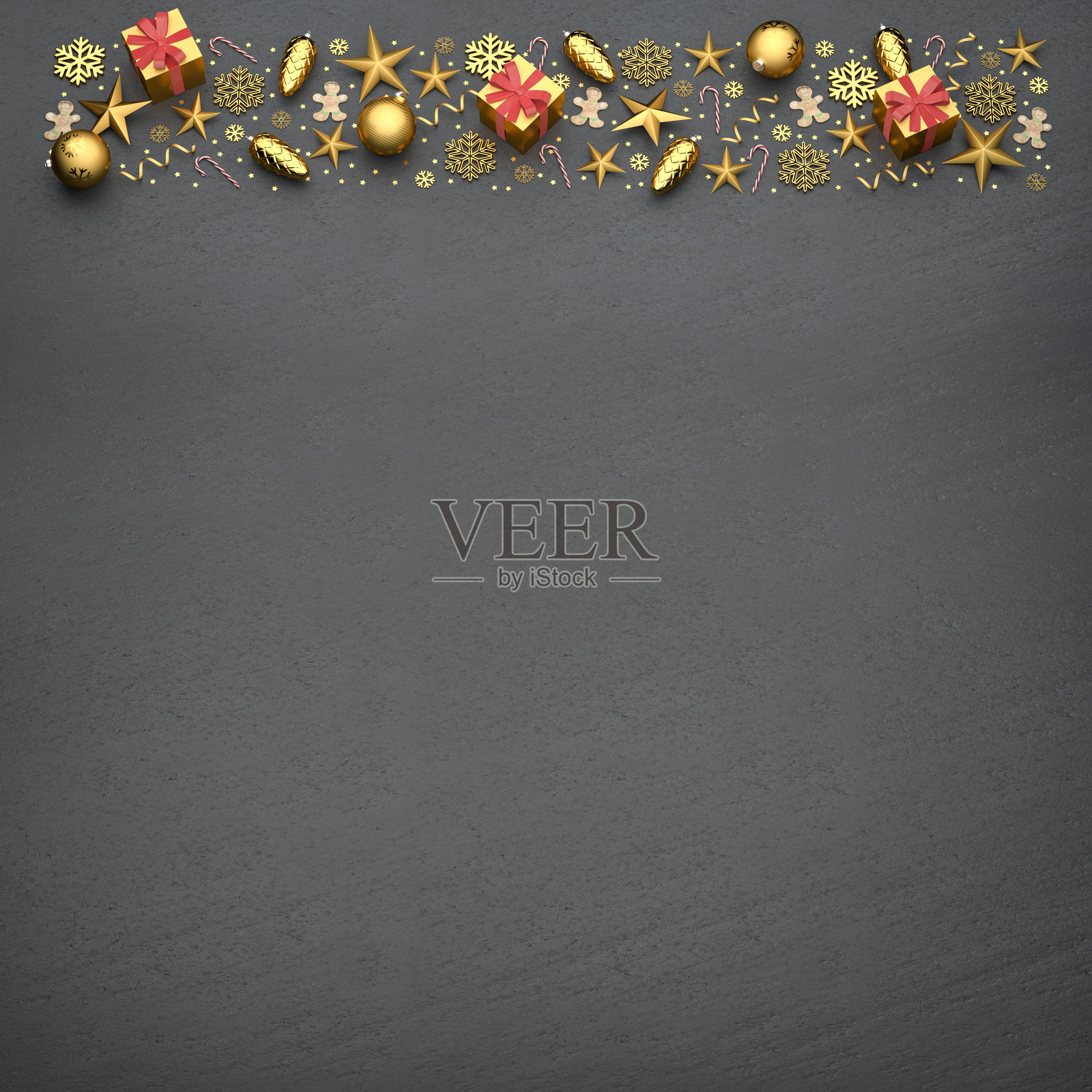 将金色的圣诞装饰品和糖果平铺在黑色的石制盘子上。在底部复制空间。照片摄影图片