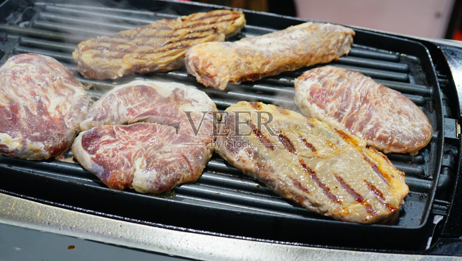 用牛排烹调肉类照片摄影图片