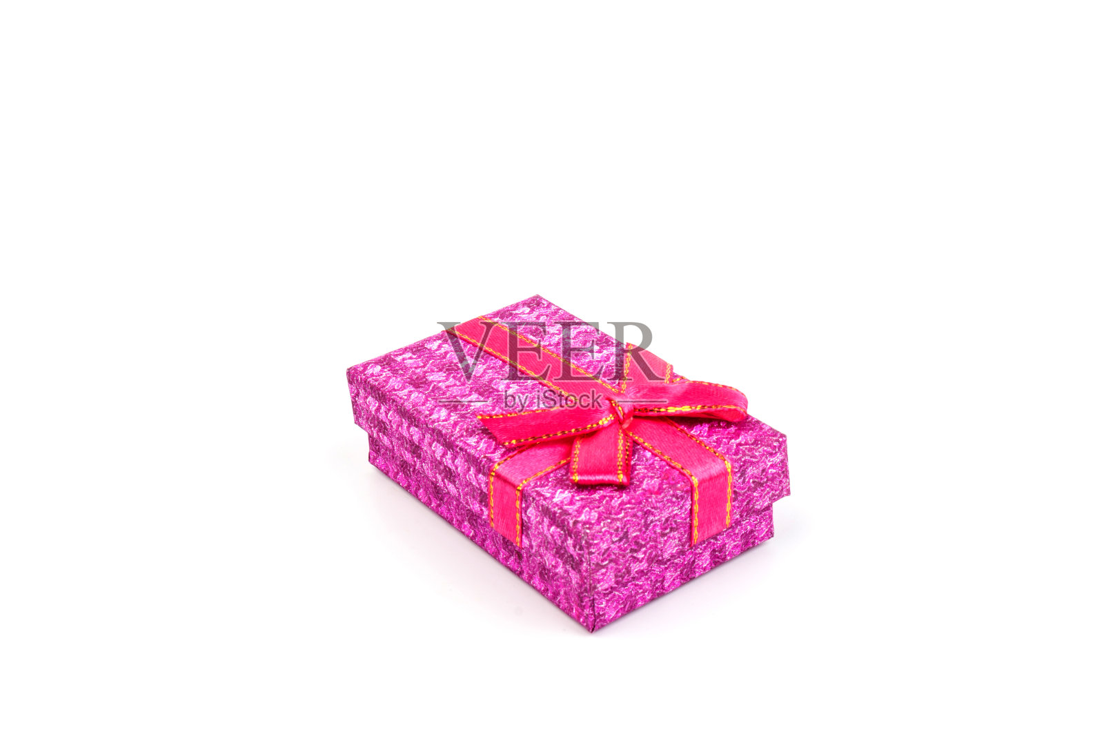 美丽的礼盒与一个蝴蝶结在白色的背景。复制spase照片摄影图片