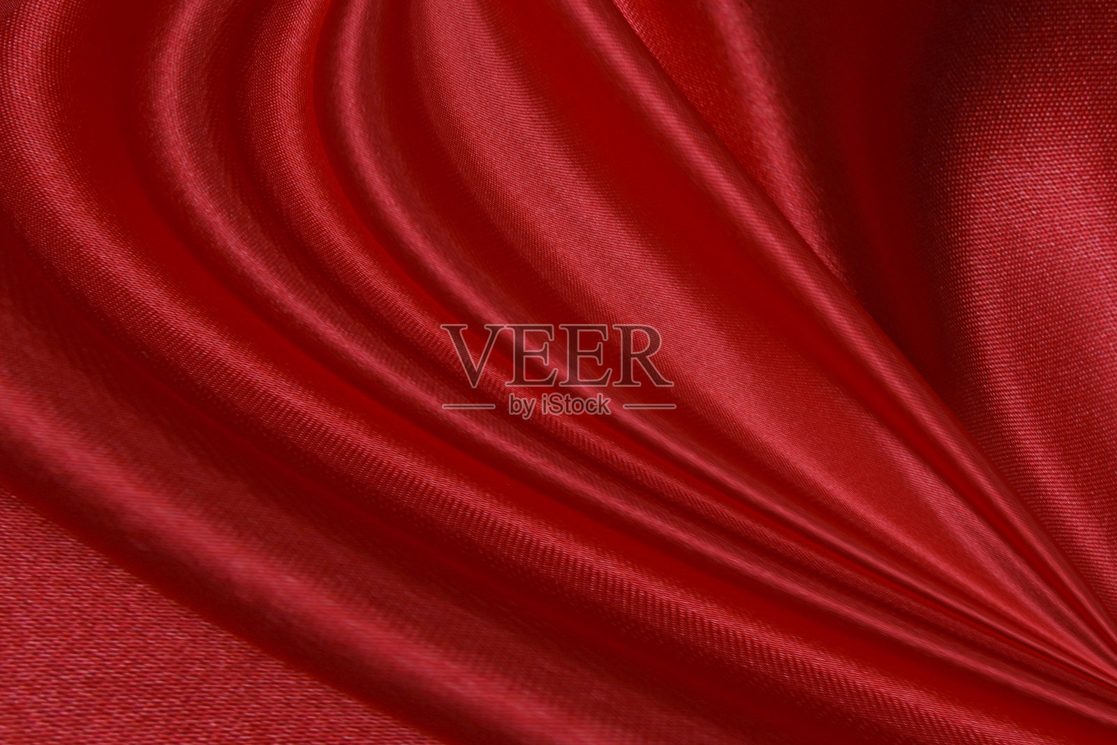 红布波浪背景纹理。照片摄影图片