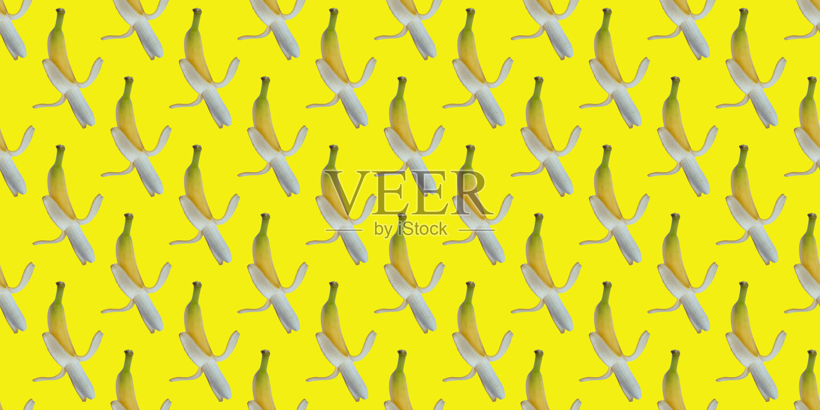 无缝模式与香蕉在黄色的背景。装饰、包装、横幅用图纸。广告。照片摄影图片