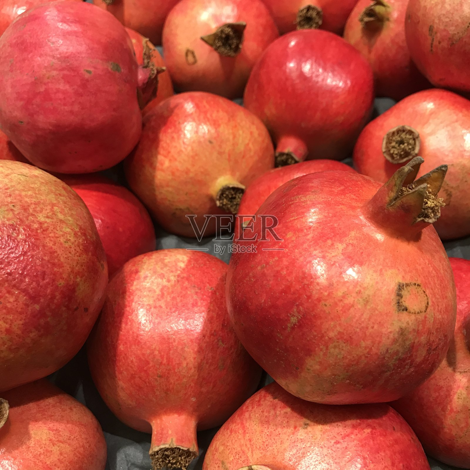 从上面看是红色的石榴照片摄影图片