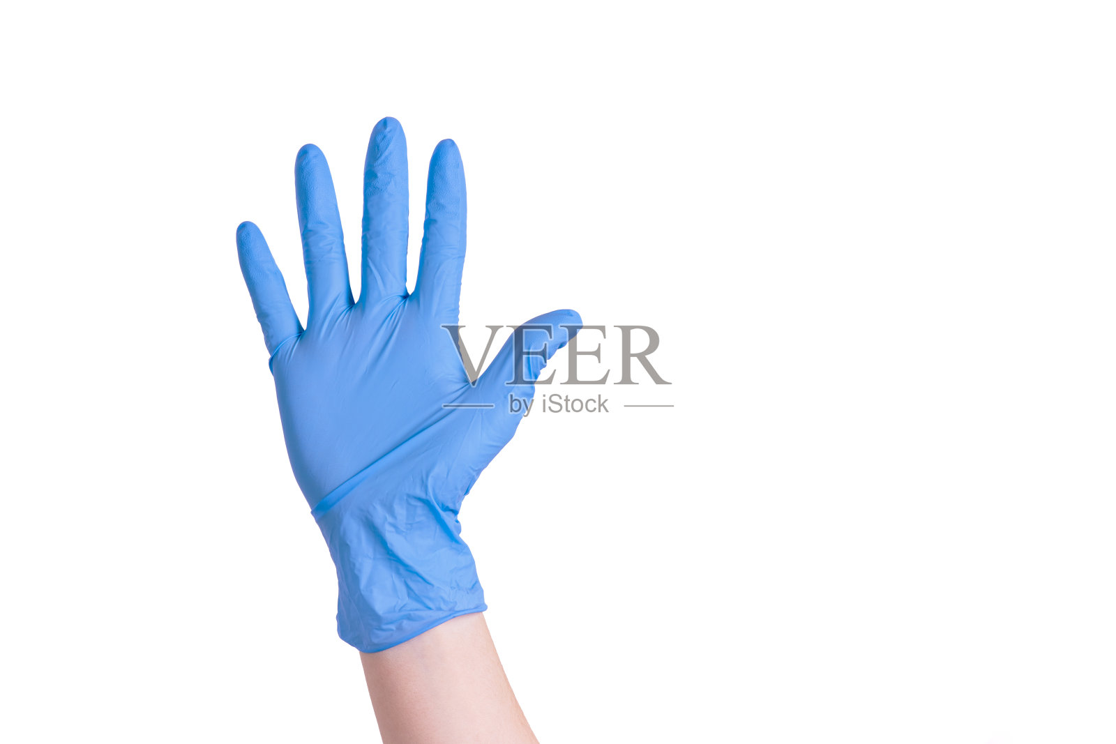 冠状病毒大流行的蓝色手套中医护人员的手照片摄影图片