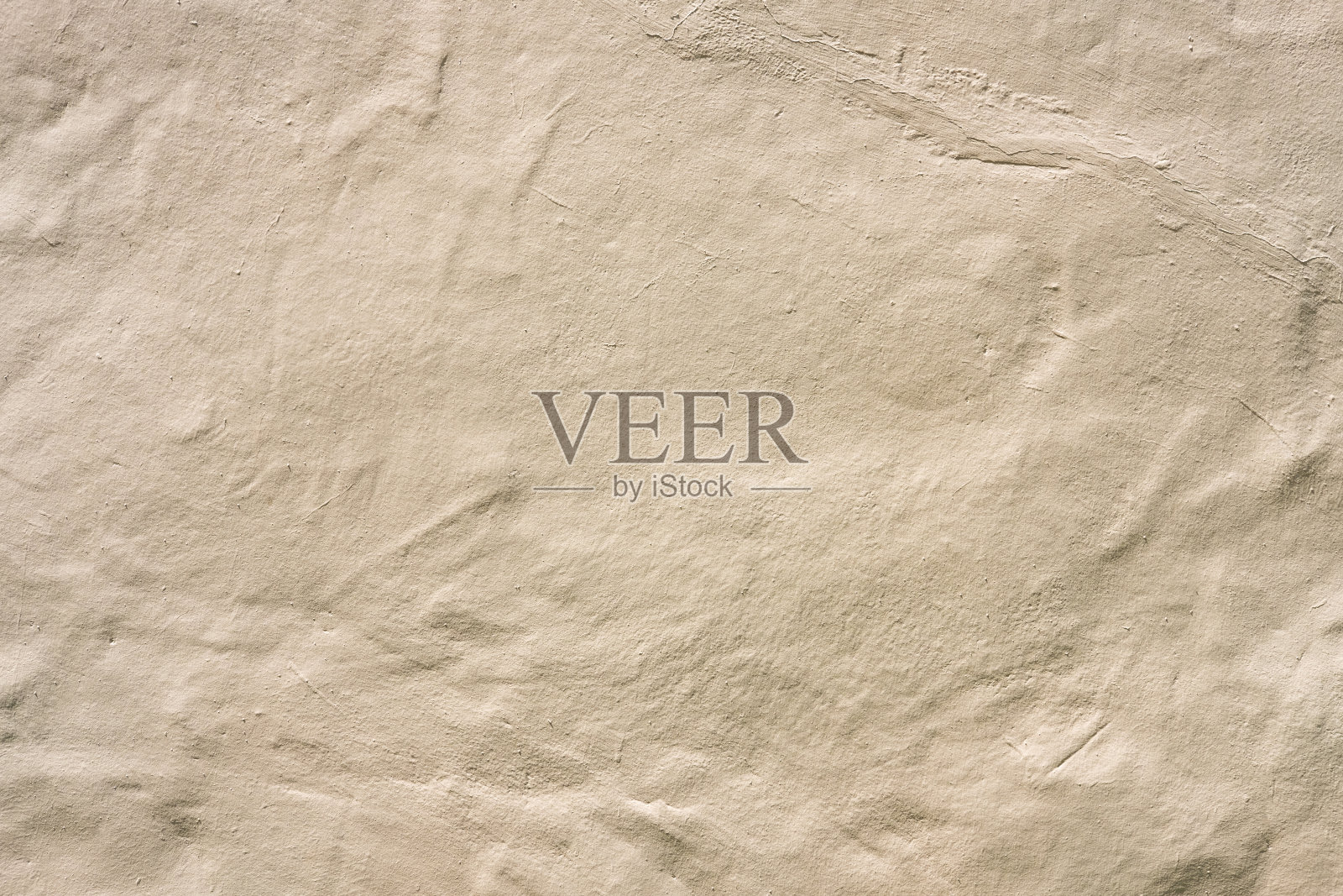 粗糙的棕色混凝土表面，显示了材料纹理的梯度和细节。理想的壁纸，天然水泥背景。照片摄影图片