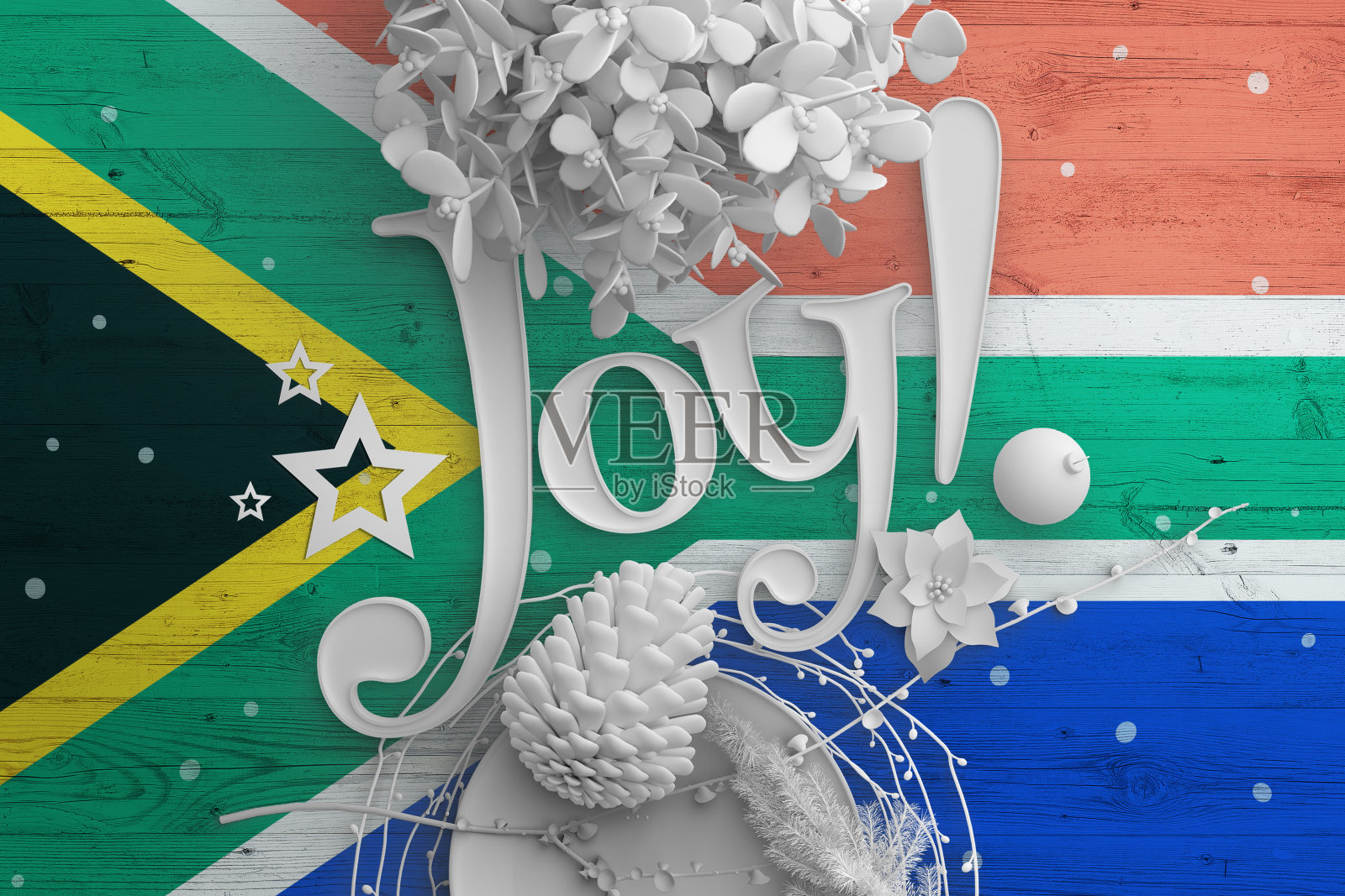 南非国旗木制桌子上有Joy的文字。以圣诞和新年为背景，以白色装饰庆祝民族概念。照片摄影图片