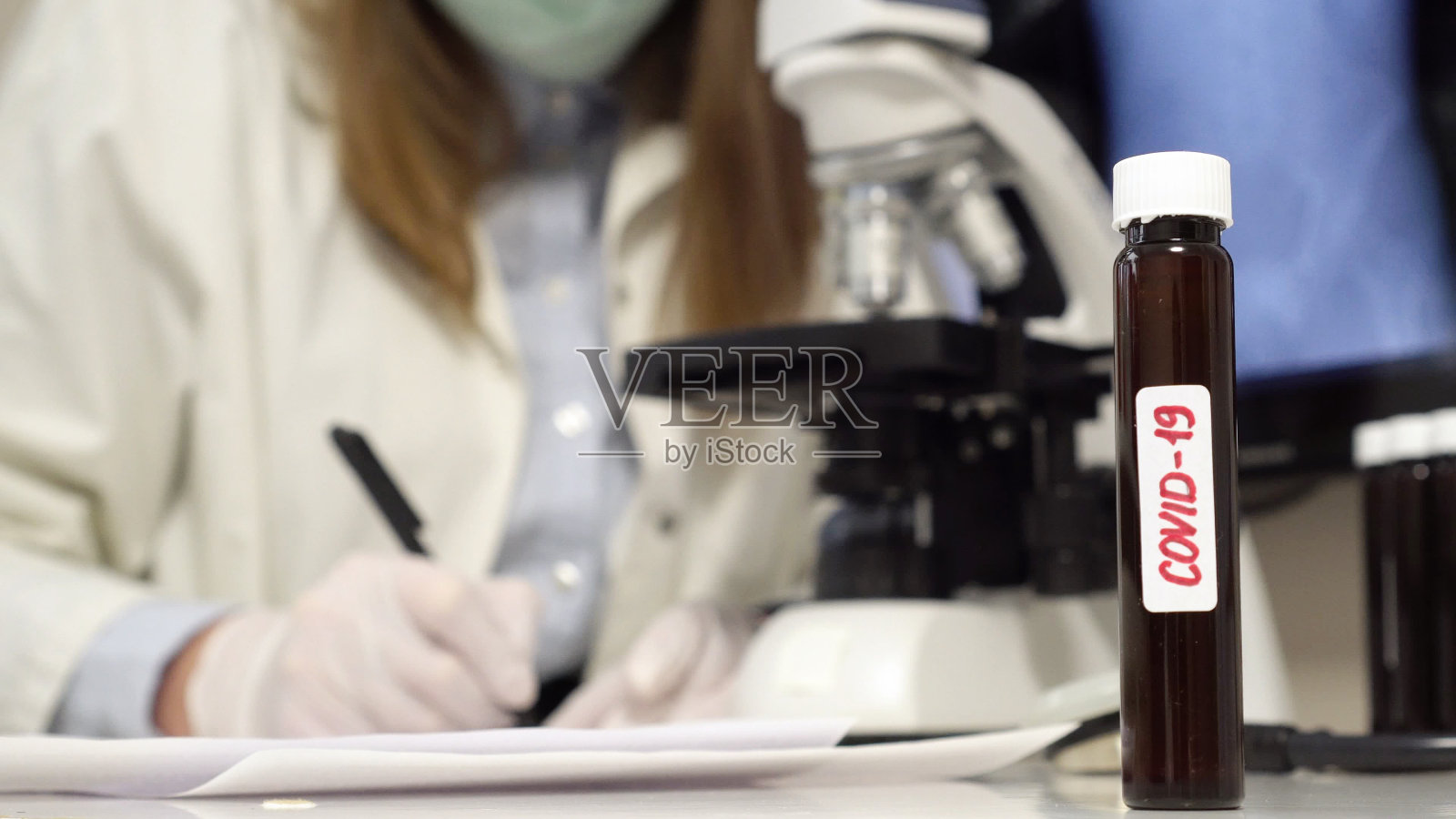 实验室Covid-19样管。冠状病毒的概念。照片摄影图片