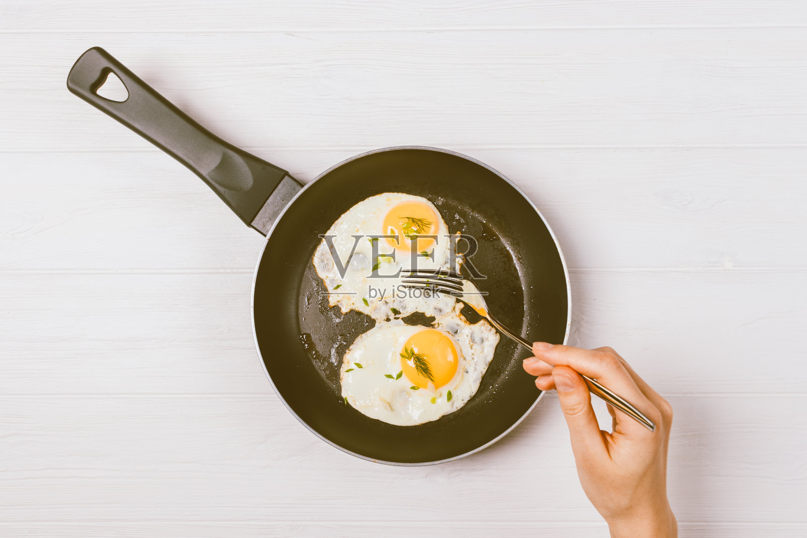 俯视女性的手持叉照片摄影图片