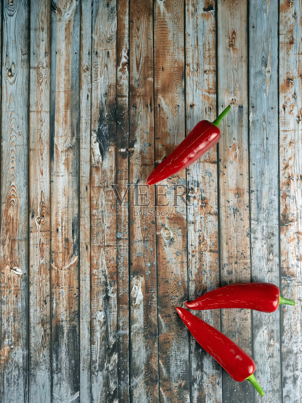 黑木背景设计，配辣椒照片摄影图片