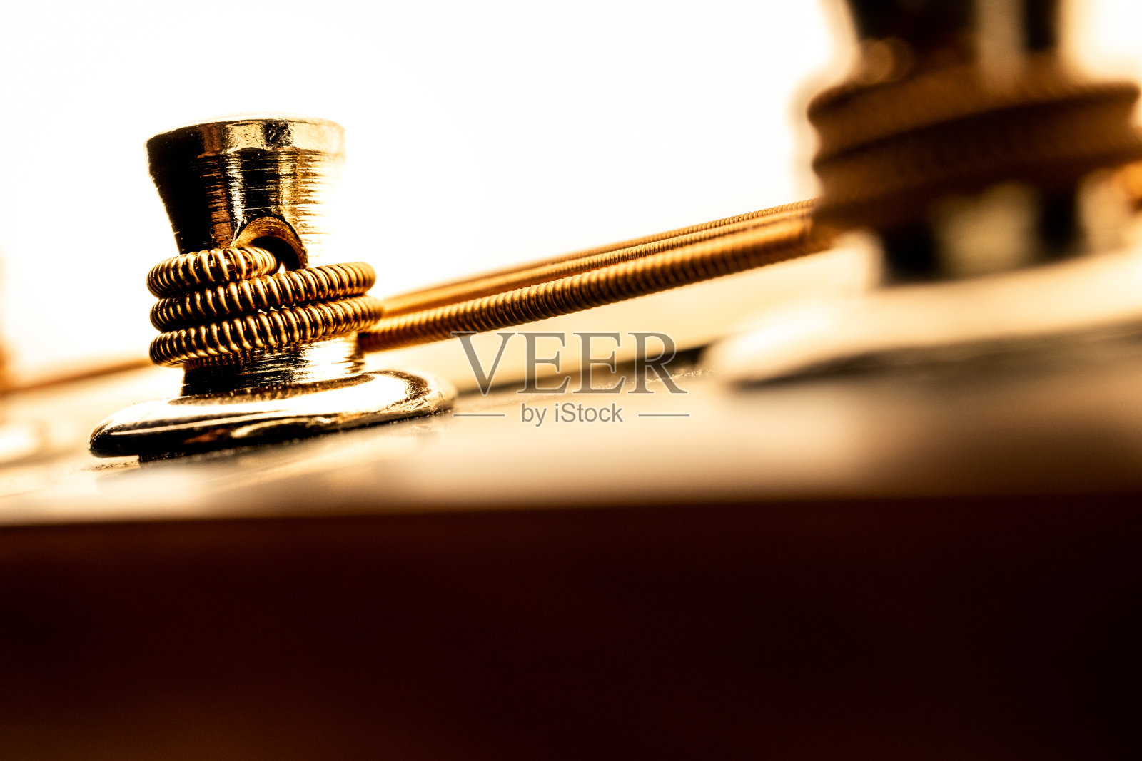 曼陀林调音柱下面的特写照片摄影图片