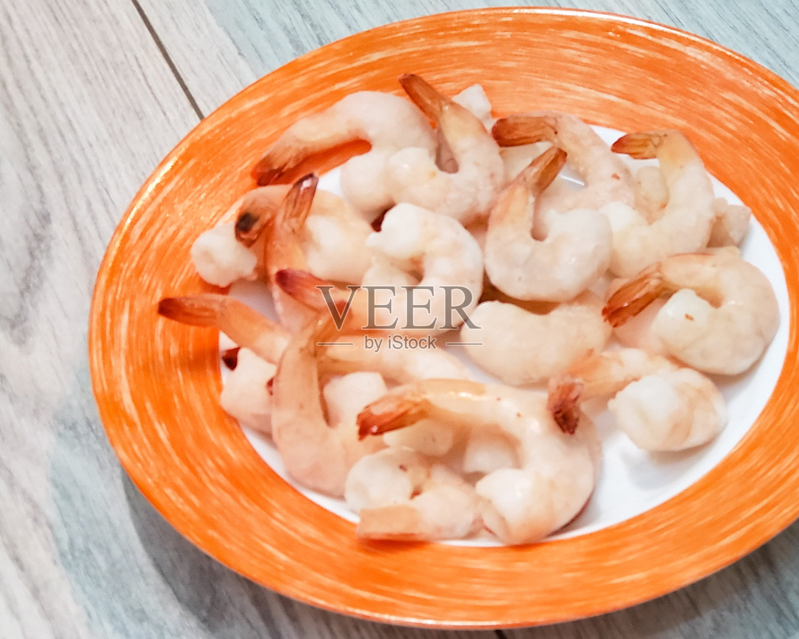 冷冻预煮虾的特写。冻虾仁照片摄影图片