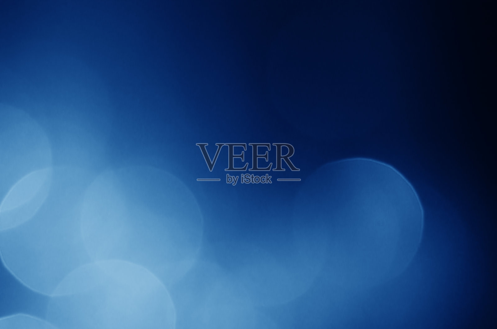 闪烁的光闪耀蓝色华丽的散焦散焦抽象背景闪亮。照片摄影图片