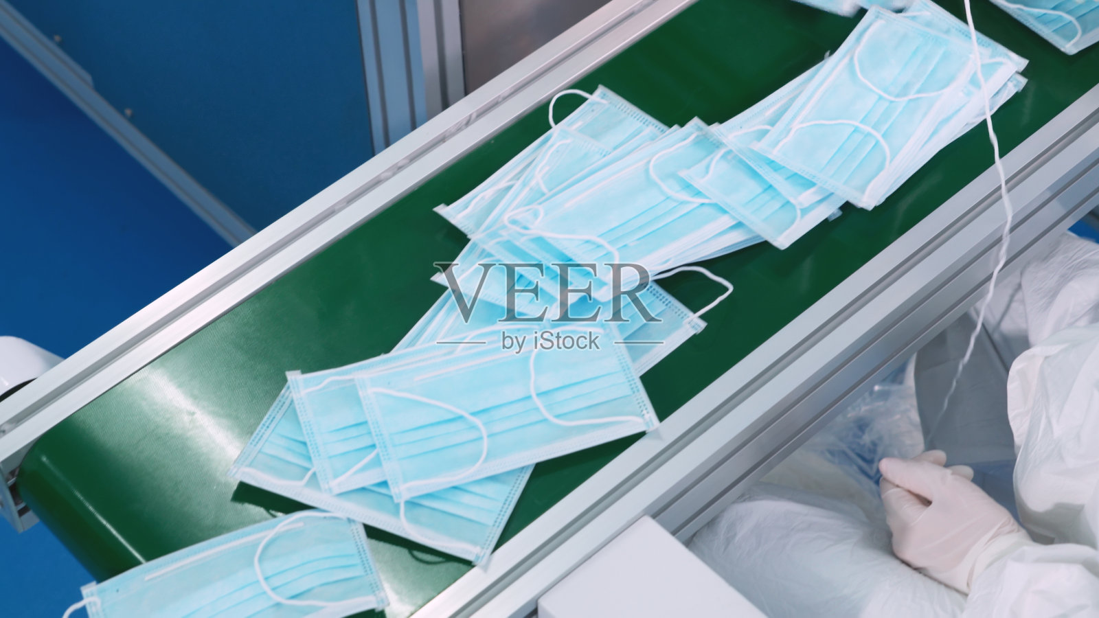 现代化的口罩生产线工厂照片摄影图片