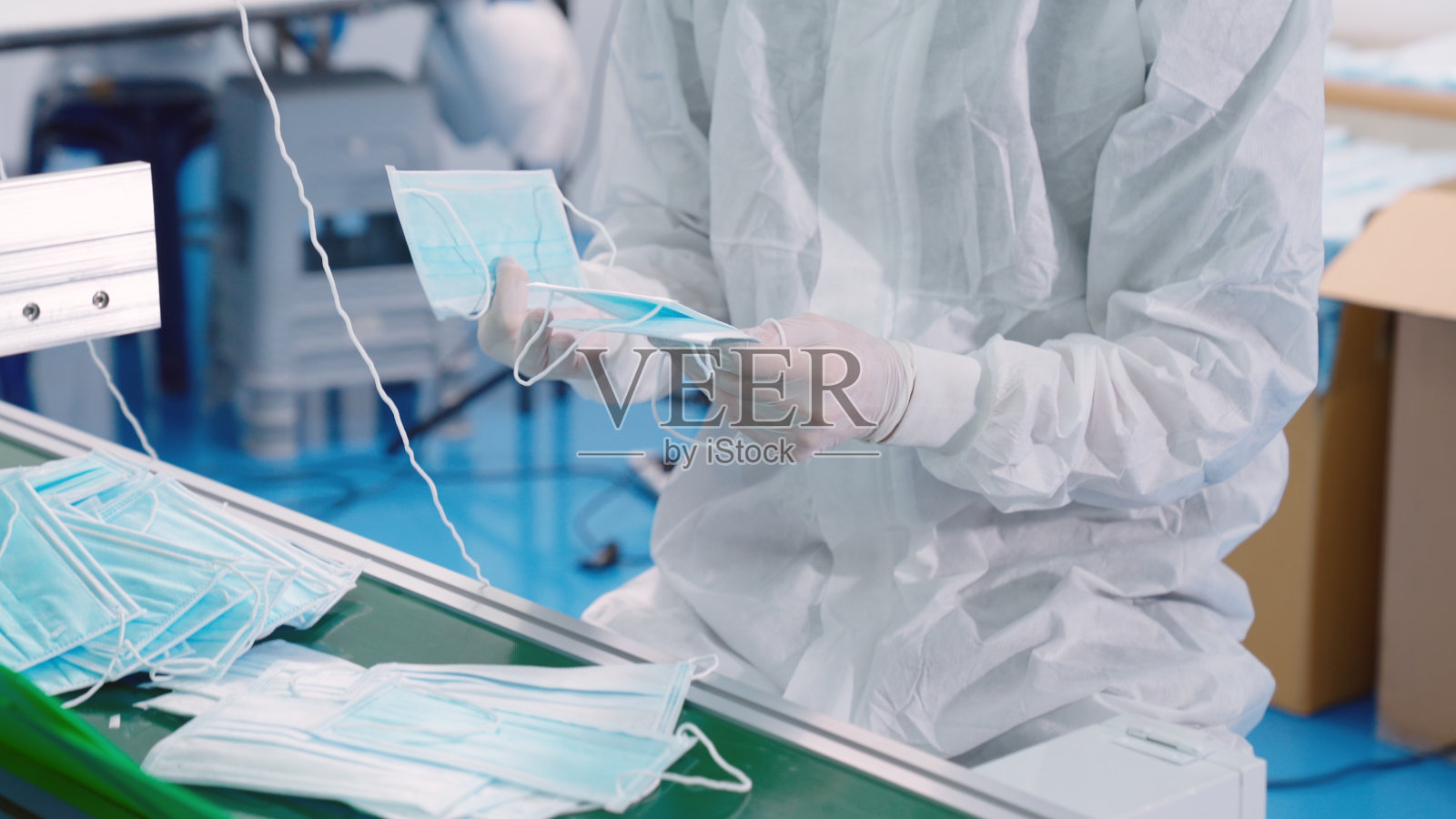 现代化的口罩生产线工厂照片摄影图片