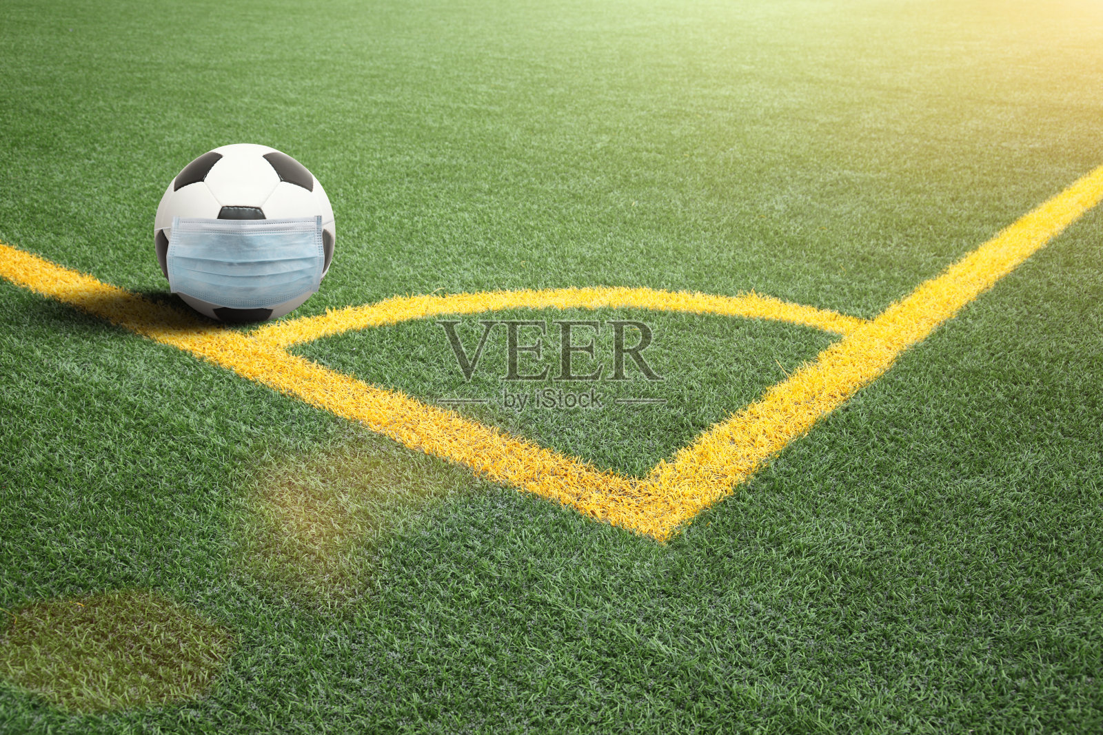 足球赛事通过冠状病毒的时间照片摄影图片