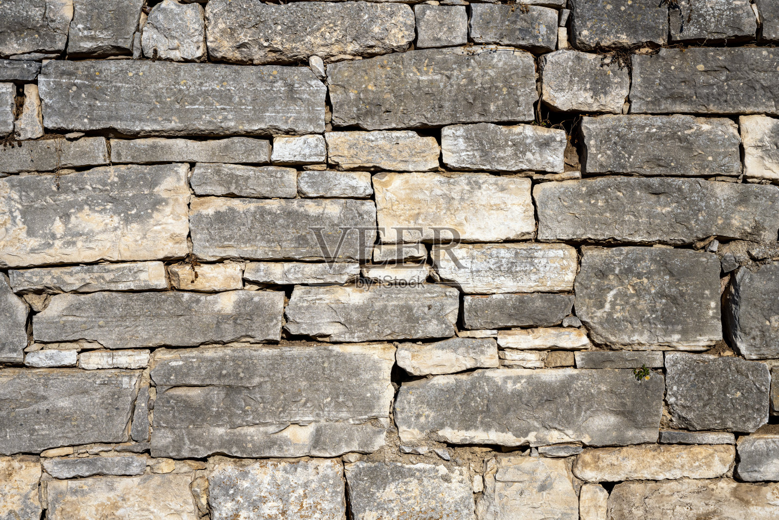 破旧的天然石墙照片摄影图片