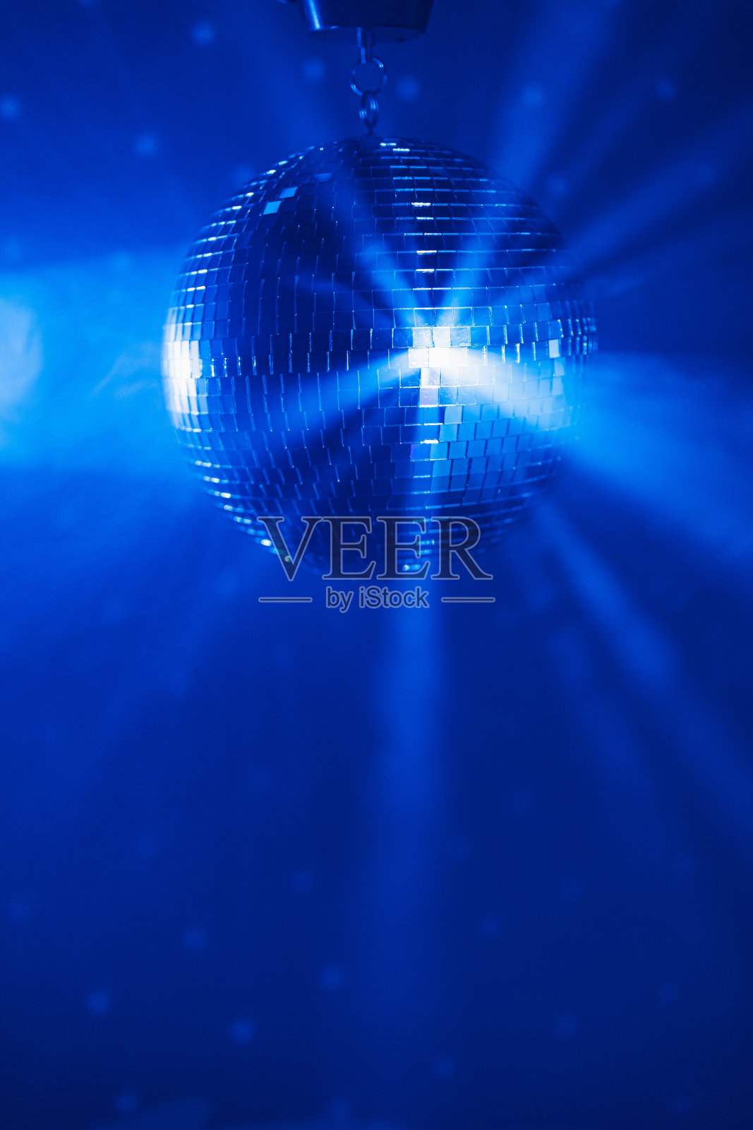 迪斯科球背景与蓝色闪亮射线照片摄影图片