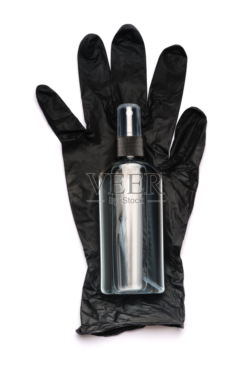 抗击COVID-19病毒爆发的安全设备——洗手液和乳胶手套照片摄影图片