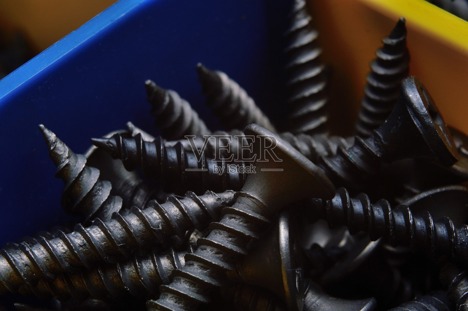 组织者的自攻螺钉。照片摄影图片