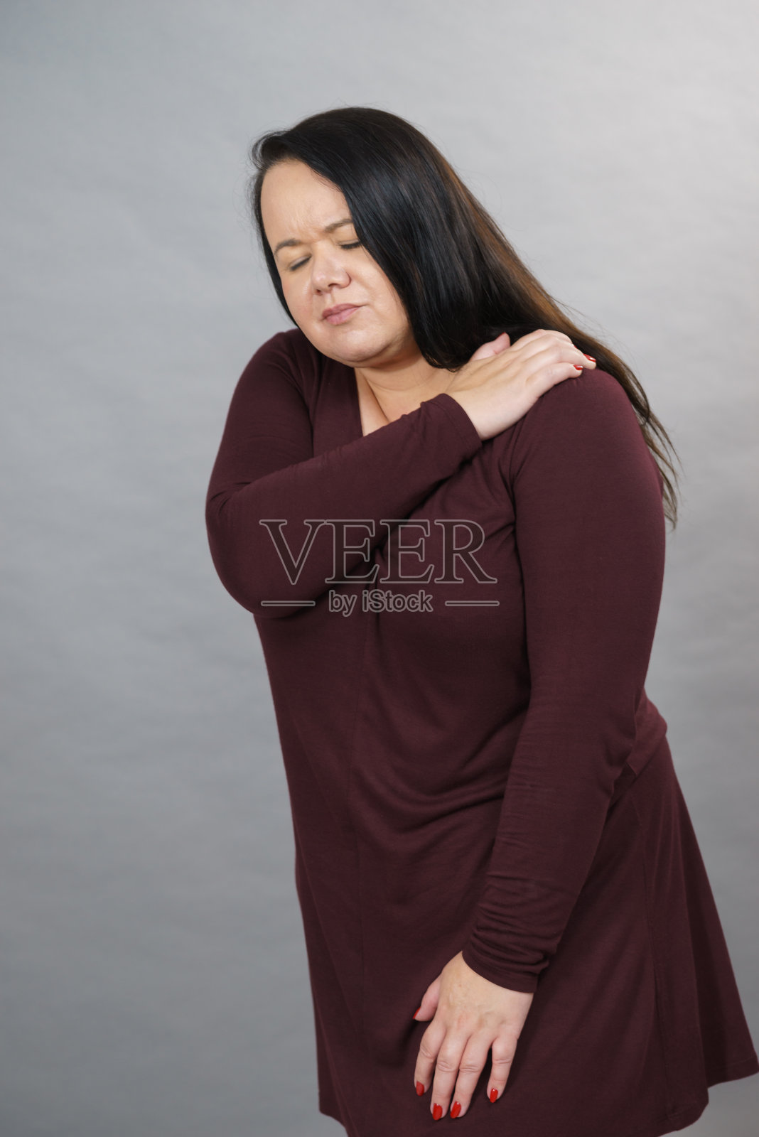 肩膀疼痛的女人照片摄影图片