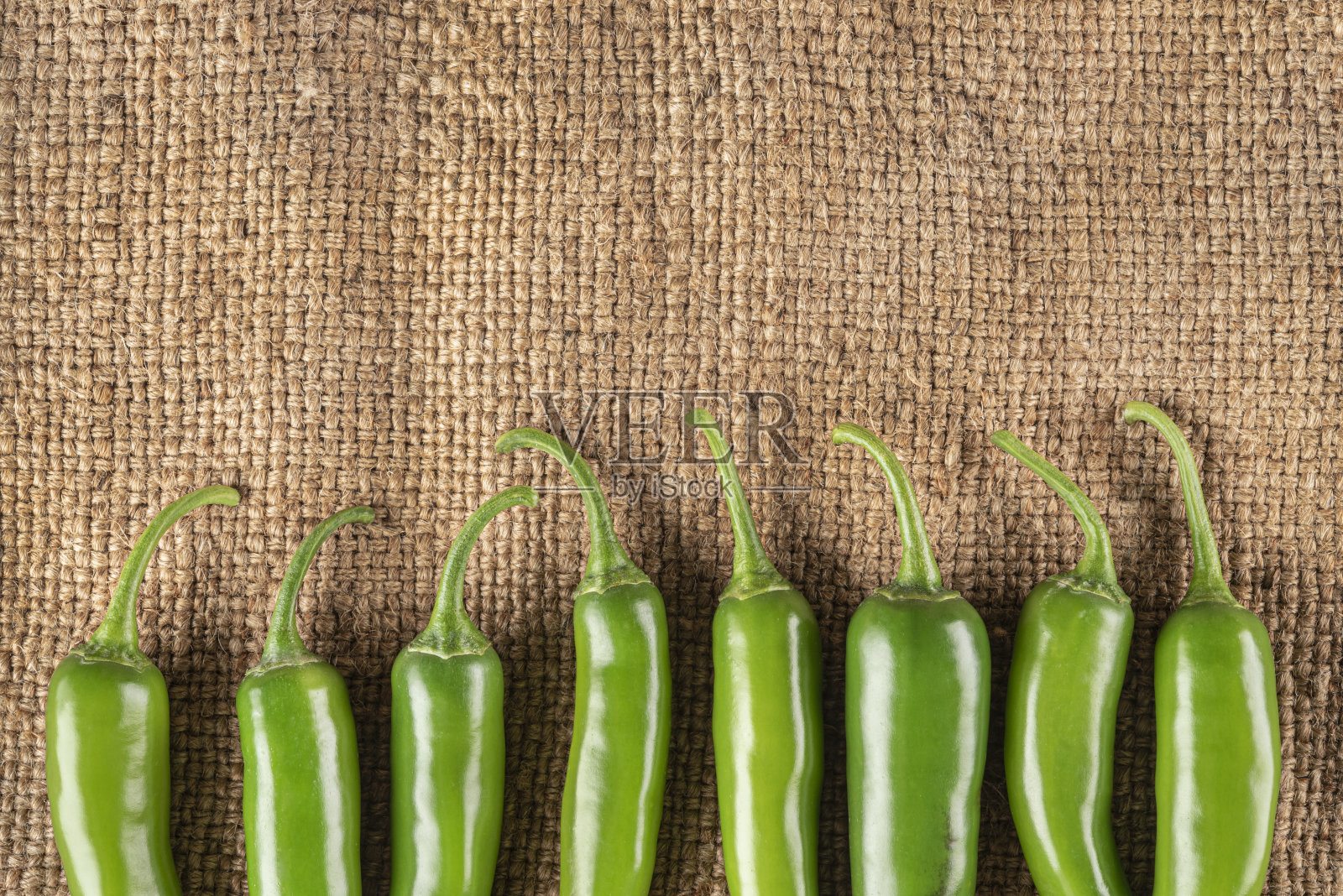 墨西哥辣椒排成一行照片摄影图片