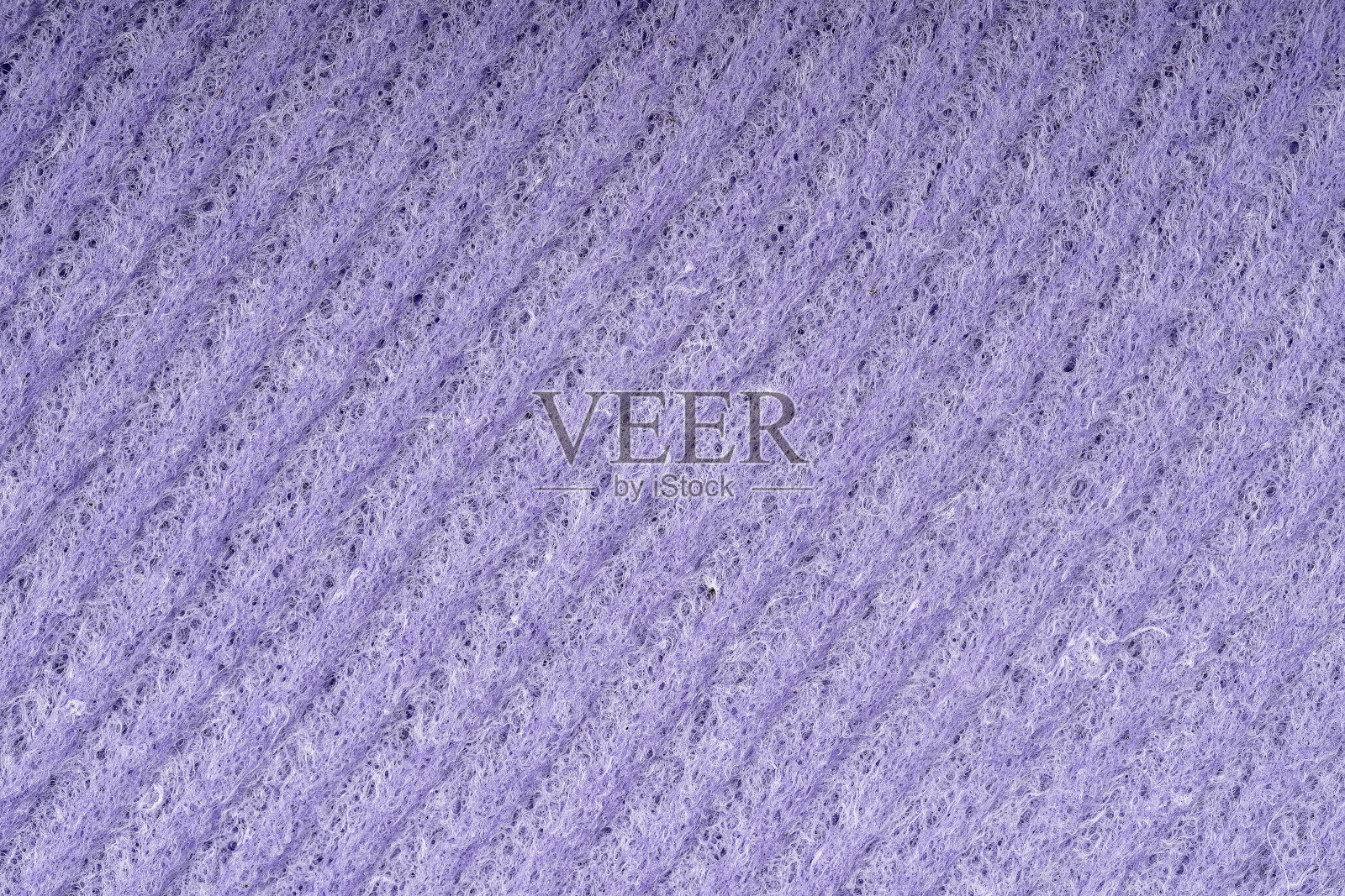 家用清洁海绵特写。海绵纹理细节，海绵纹理特写背景。纤维素海绵质地。丝网海绵表面背景照片摄影图片