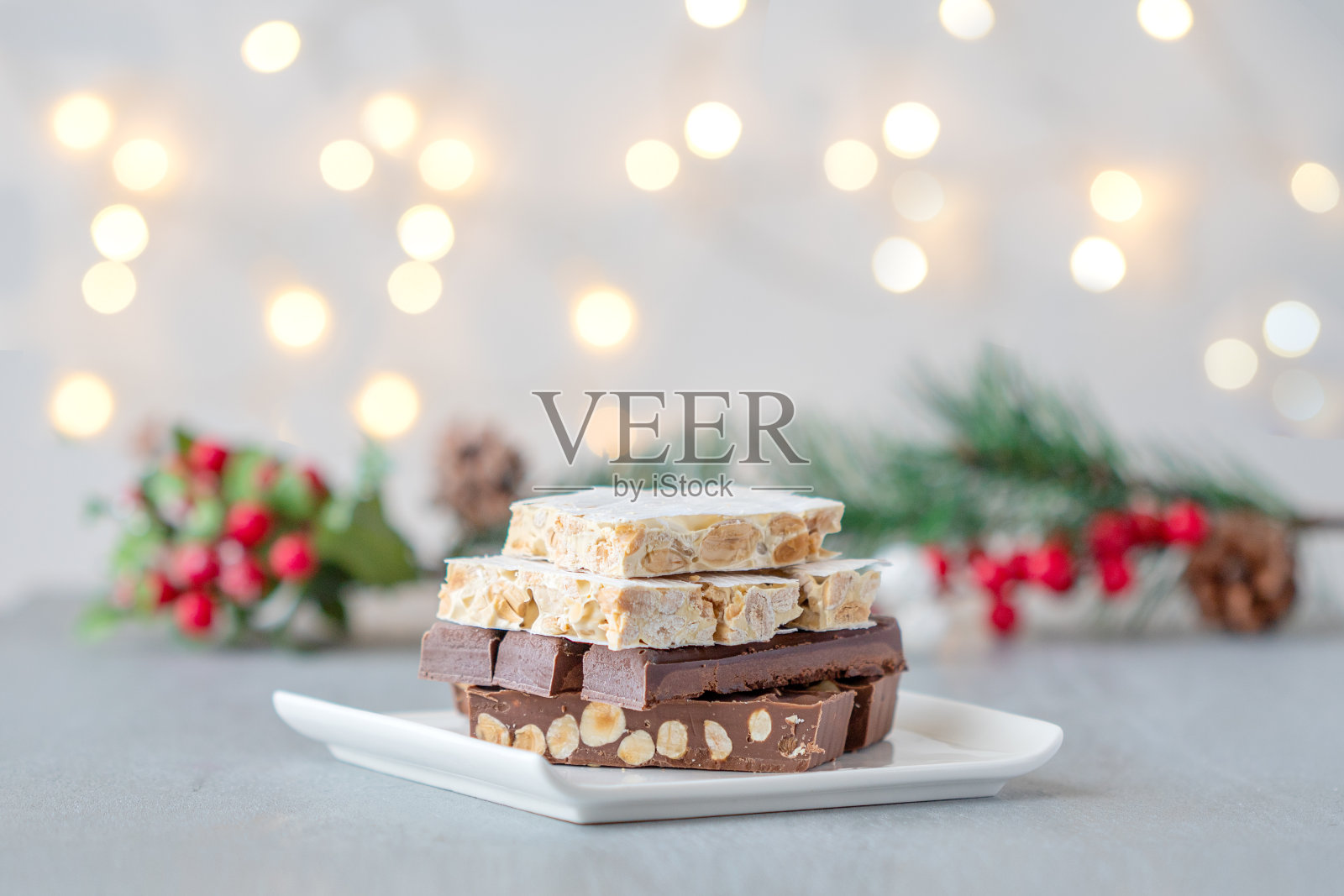 西班牙圣诞糖果牛油和明亮的灯光背景照片摄影图片