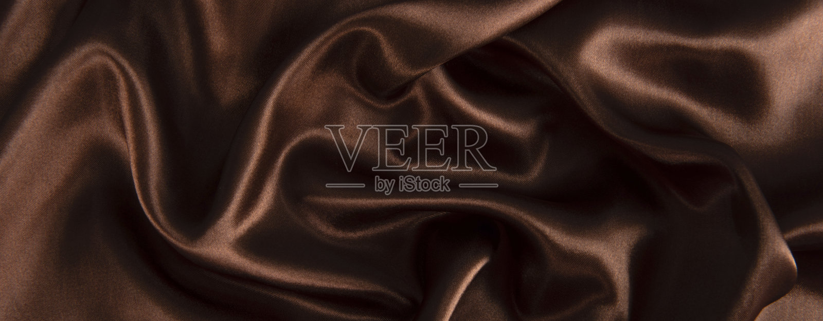 抽象巧克力背景，棕色抽象缎丝照片摄影图片