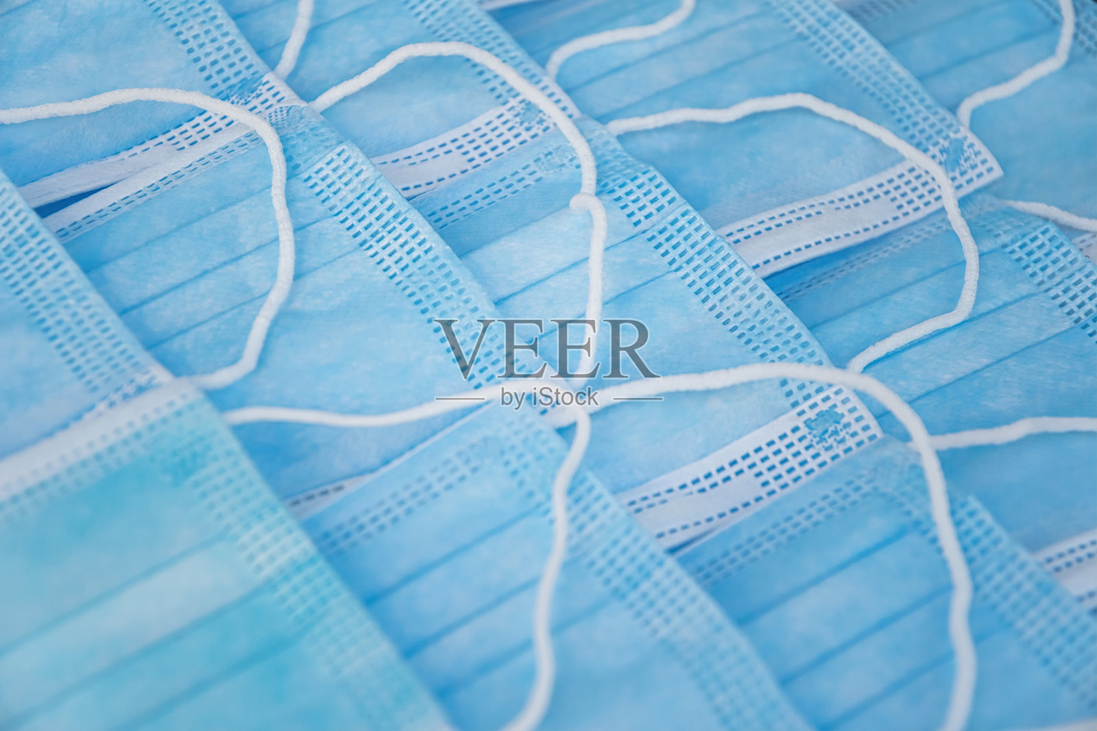 一堆蓝色无菌医用口罩照片摄影图片