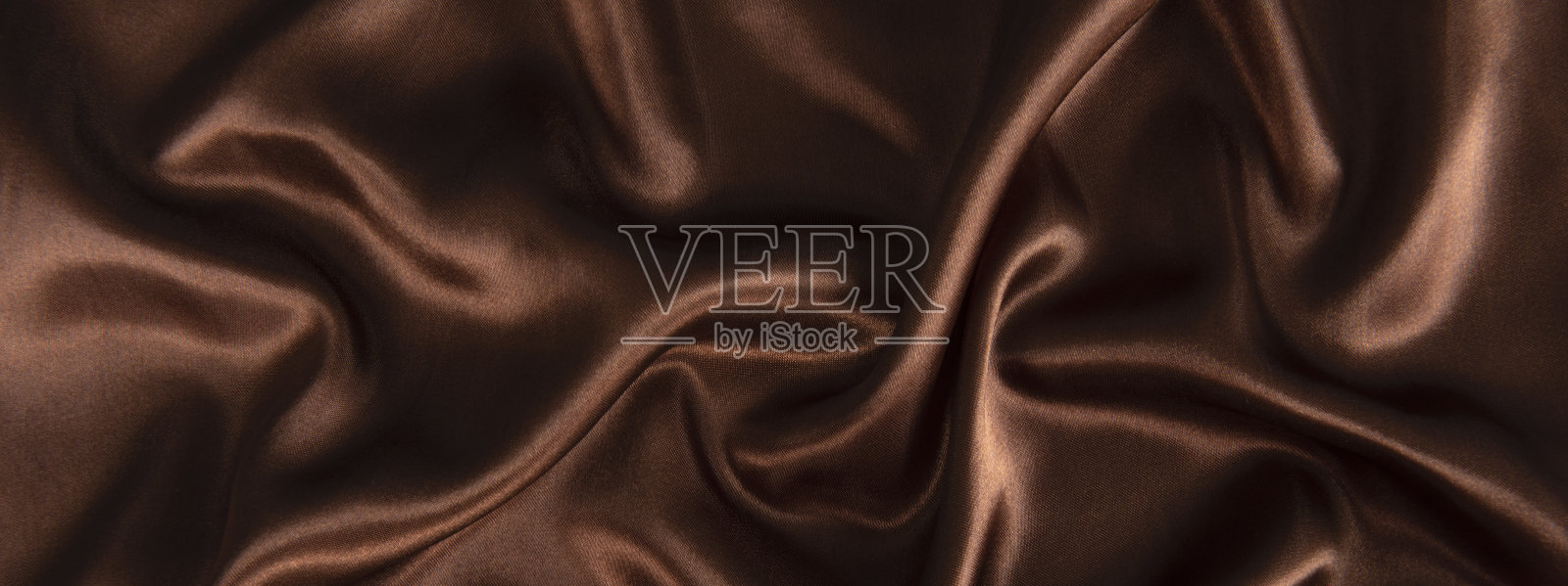抽象巧克力背景，棕色抽象缎丝照片摄影图片