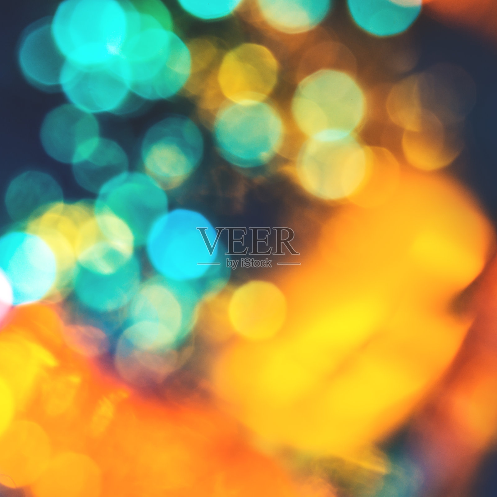 蓝绿色和橘色的灯光散景背景照片摄影图片