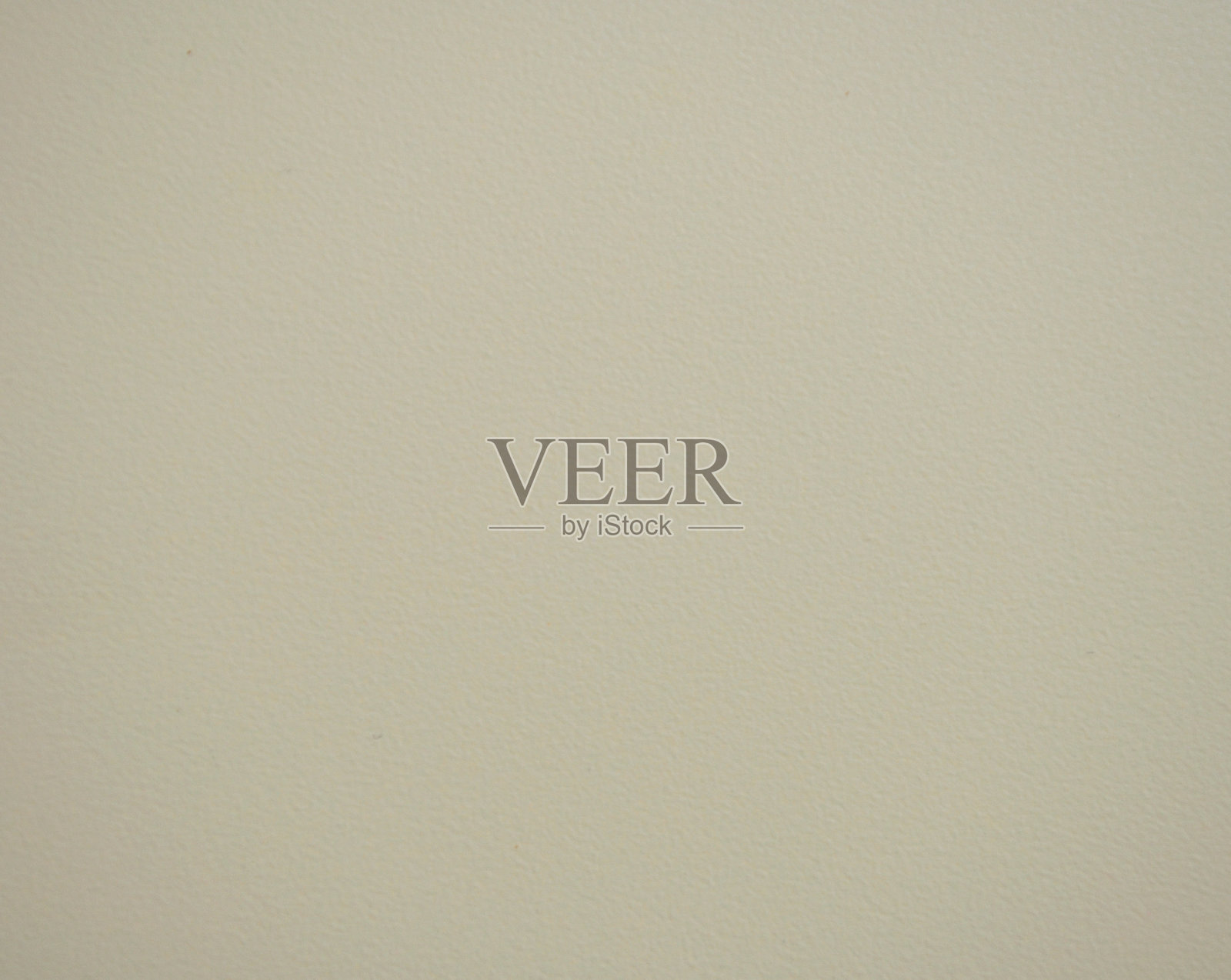 浅灰色的粗切石头的粗糙表面的特写。照片摄影图片