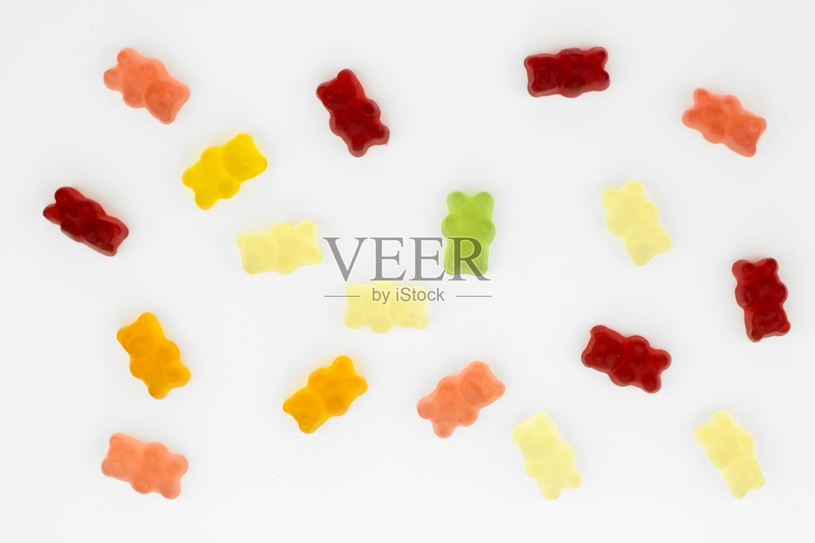 彩色的吃小熊软糖果冻糖果孤立在白色背景。前视图。照片摄影图片