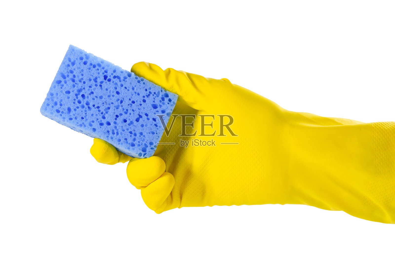 女人用手洗盘子用的海绵。手戴一只黄色手套，隔离在白色背景上。照片摄影图片