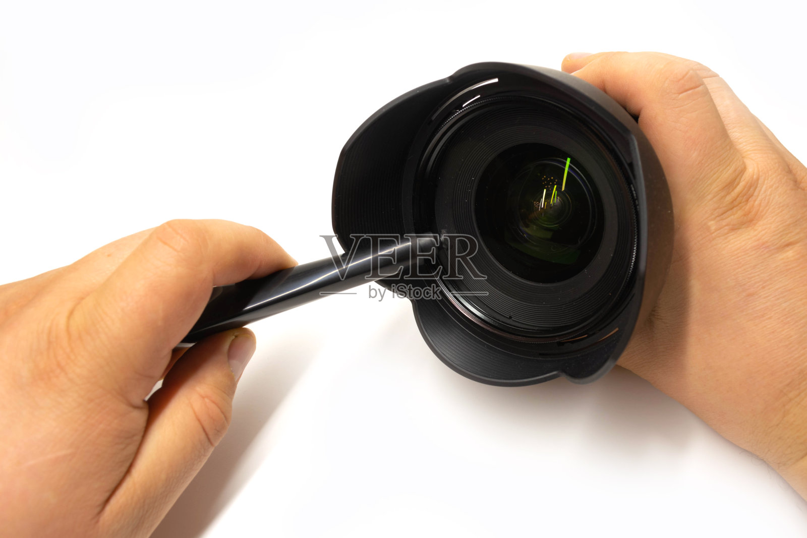 在白色背景下清洗照片镜头照片摄影图片